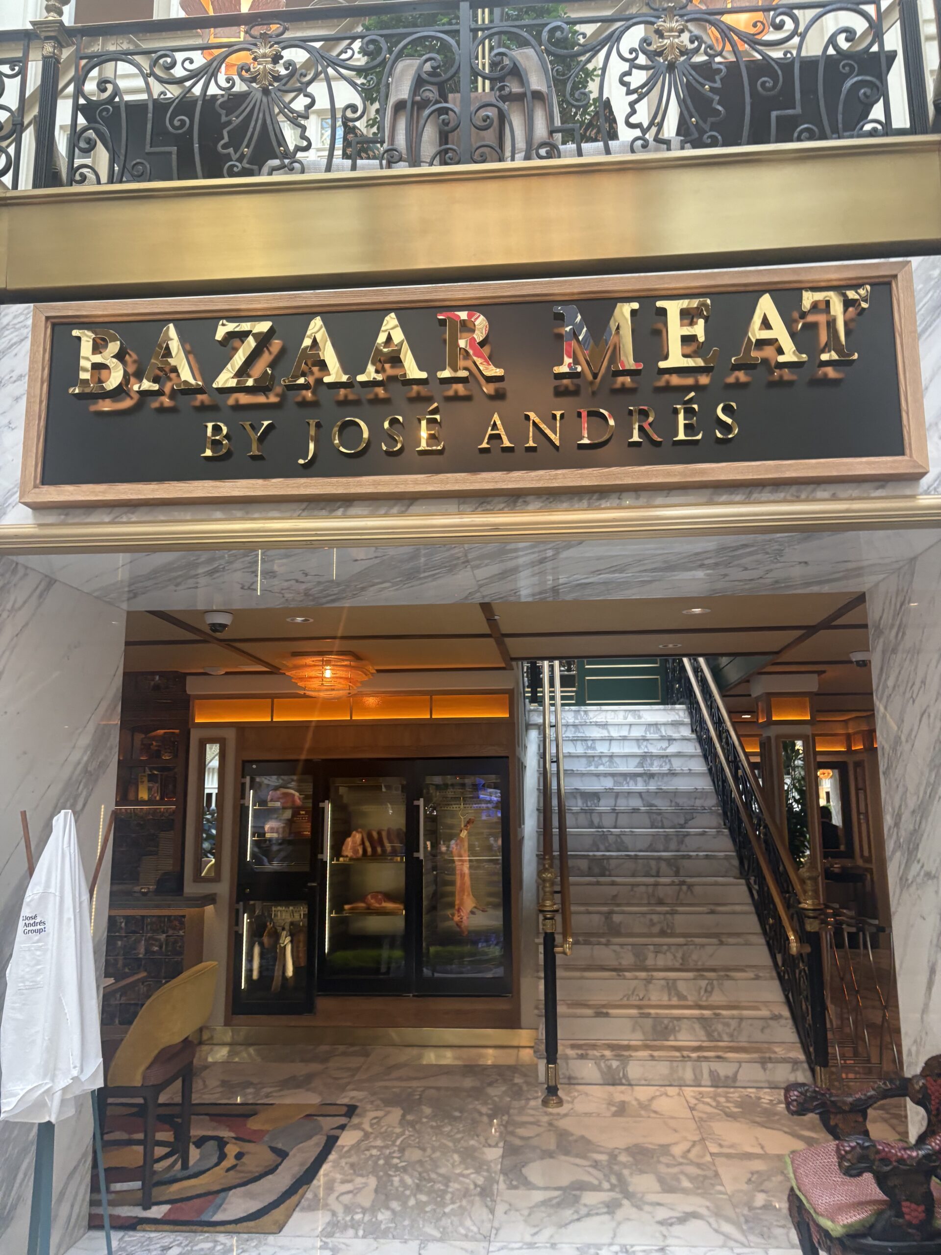 Bazaar Meat by José Andrés entrance sign inside Waldorf Astoria Washington DC